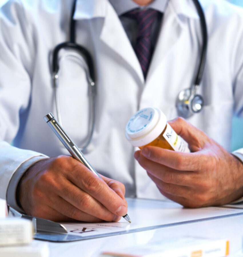 A professional doctor in Los Angeles, California, writing a prescription for prescription drug addiction treatment A professional doctor in Los Angeles, California, writing a prescription for prescription drug addiction treatment