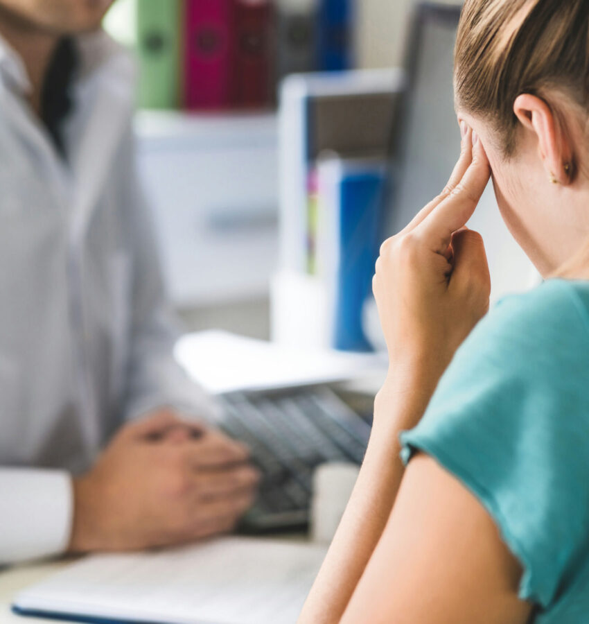 A woman seeks guidance from a counselor through motivational interviewing in Los Angeles, focusing on overcoming challenges and building motivation.